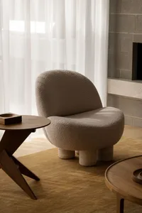 Modern living room with fabric furniture, minimalistic design and concrete legs.