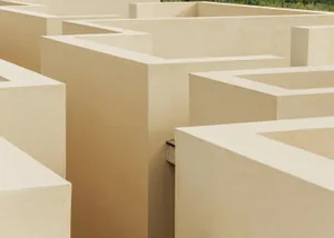 A minimalist concrete maze, featuring clean lines and geometric shapes.