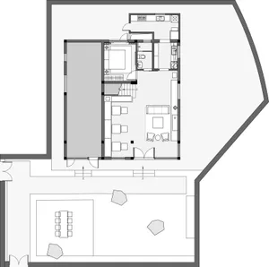 Floor plan of a modern residential layout, showing living space, kitchen, bedroom, and bathroom.