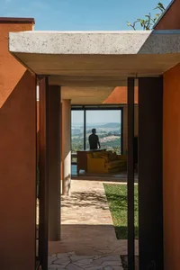 Concrete patio of a modern interior with a view of the outdoors.