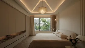 Contemporary bedroom with white bed, marble headboard, and fabric bedding, featuring a large window overlooking greenery