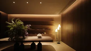 A modern dining room with wooden furniture and shelves.