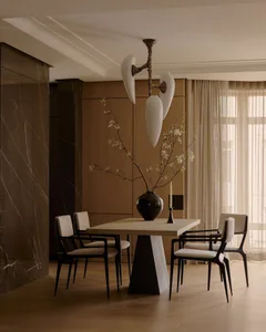 Modern living room featuring wooden surfaces and minimalist decor.