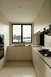 A modern minimalist white kitchen with a large window providing a view of the cityscape and green mountains.