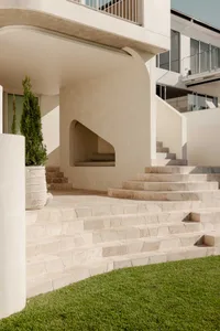 Modern exterior of a building with concrete and stone materials