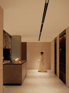 A minimalist kitchen with stone materials and modern design elements