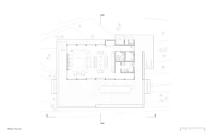 Floor plan of a modern residential building with indoor and outdoor spaces.