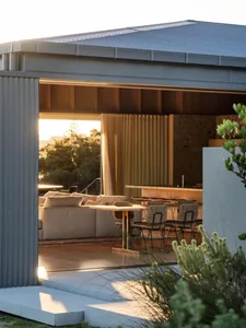An elegant, contemporary residential space featuring wooden elements.