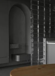 Modern kitchen featuring glass block tiles