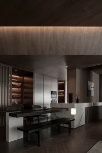 Modern dark wood and marble kitchen with minimalist design