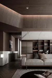 Industrial-style modern living room with concrete, marble, and metal materials.