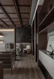 A modern closet interior featuring gray marble and wood