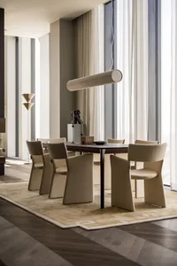 Modern dining room featuring wooden tables and chairs, with large windows and minimalist decor.