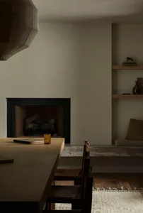 A minimalist residential space with wooden interior details.