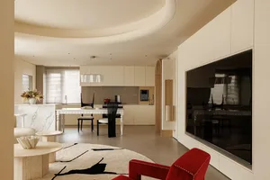 Modern kitchen featuring marble countertops and countertops with stainless steel appliances.