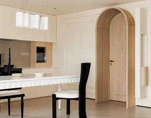 Modern kitchen with white marble countertops, stainless steel appliances, and wooden cabinets.