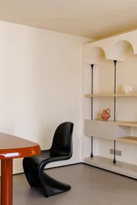 Minimalist music room with drywall panels and acoustic treatment for soundproofing.
