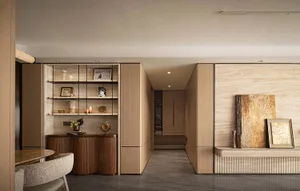 Modern interior design featuring wooden furniture and cabinetry.