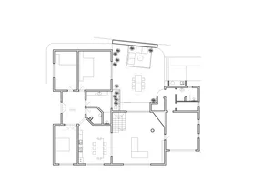 Floor plan of a modern residential layout with a glass door.