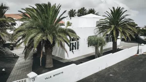 White-rendered-stone exterior of Villa Amonita
