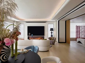 Modern living room with white marble flooring and contemporary furniture.