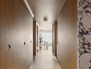A modern interior hallway with wooden panels and a marble wall