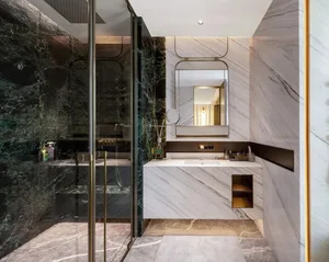 Modern industrial bathroom featuring marble walls and flooring.