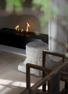 A modern industrial interior design featuring concrete as the primary structural material.