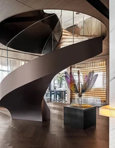 Modern industrial-inspired interior with a metallic dragonfly sculpture.