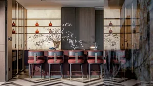 Modern bar counter space featuring a combination of marble and wood materials.