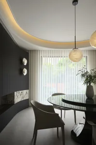 Modern dining room featuring marble and glass elements.