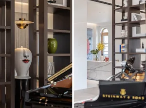A modern living room featuring a grand piano and wooden shelves with decorative items.