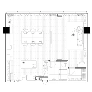 An overhead view of a modern office layout with tile flooring.