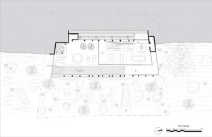 A minimalist residential floor plan showing a clean, modern layout with open spaces and simple design.