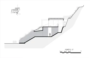 Modern house ground plan featuring large glass windows, metal railings, and concrete steps.