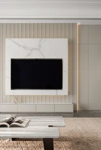Modern living room with marble accents and minimalist design.