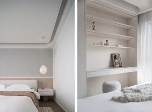 A minimalist bedroom with neutral colors and simple furnishings.