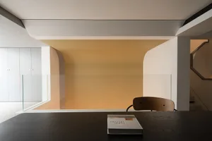 Modern interior space with a glass ceiling and minimalistic design.