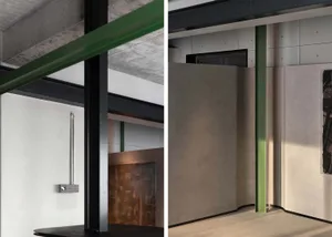 Concrete details of a modern residential interior showing structural beams, walls, and flooring.