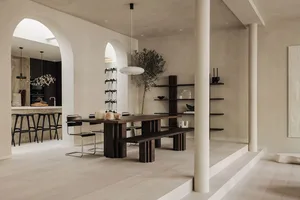 Modern dining room featuring a wooden table and seating