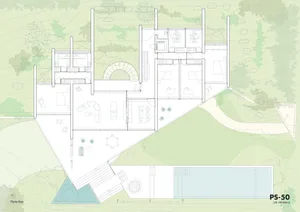 Modern house floor plan on paper, showing interior layout and design features.