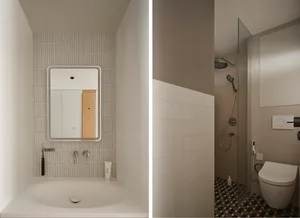 Modern bathroom with tiled wall, hooks, and sink