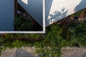 A modern architectural design with a metallic exterior.