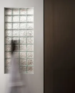 A minimalist glass block window with textured glass panels in a modern architectural setting.