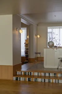A modern residential kitchen featuring wooden elements.