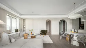 Modern apartment interior with white marble accents and glass elements