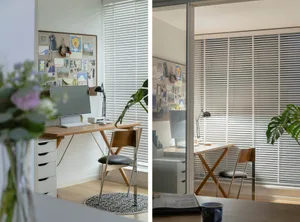 A modern home office with wooden desks, fabric chairs, and metal accents, featuring a bulletin board and a sleek, contemporar