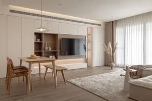 A modern living room with wooden furniture, leather accents, and glass elements, featuring a dining table, sofa, pendant ligh