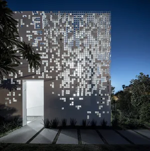 Modern building exterior composed of metallic pixelated panels
