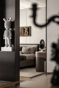 A modern minimalist bedroom showcasing sleek furniture and contemporary decor.